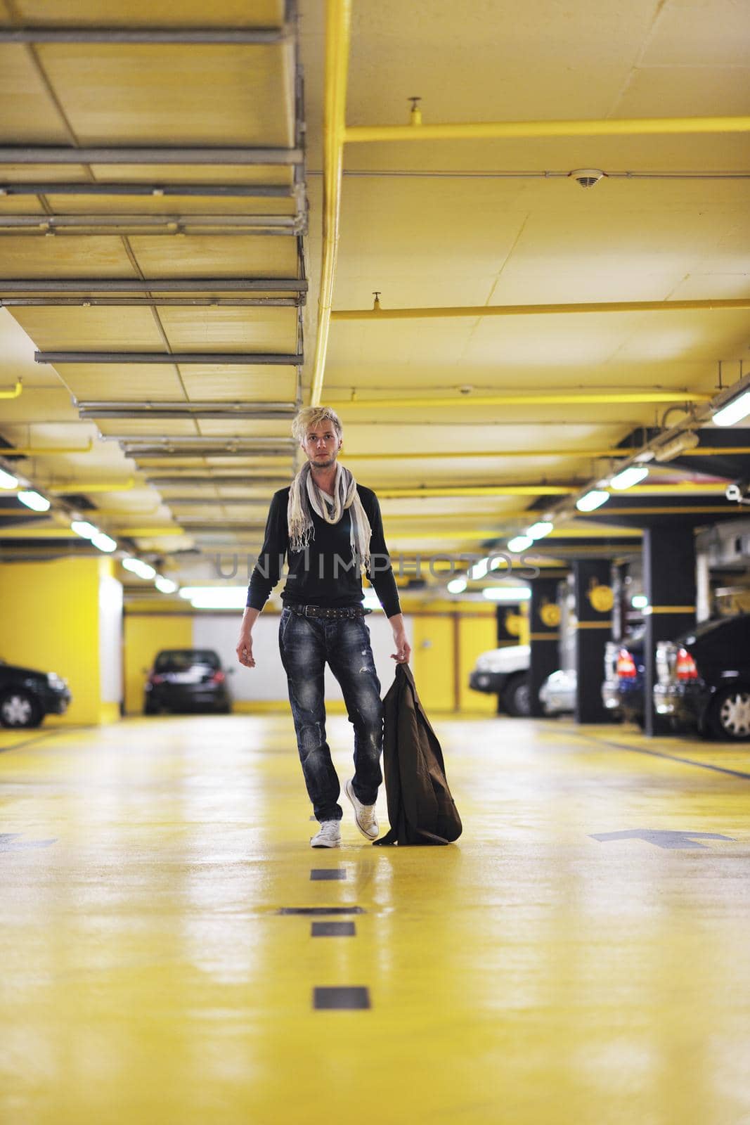 Portrait of an handsome young  man  with urban background and fashion clothes style