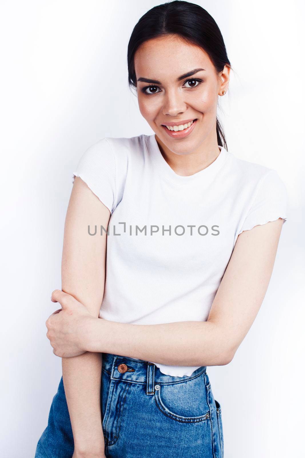 young happy smiling latin american teenage girl emotional posing isolated on white background, lifestyle people concept close up