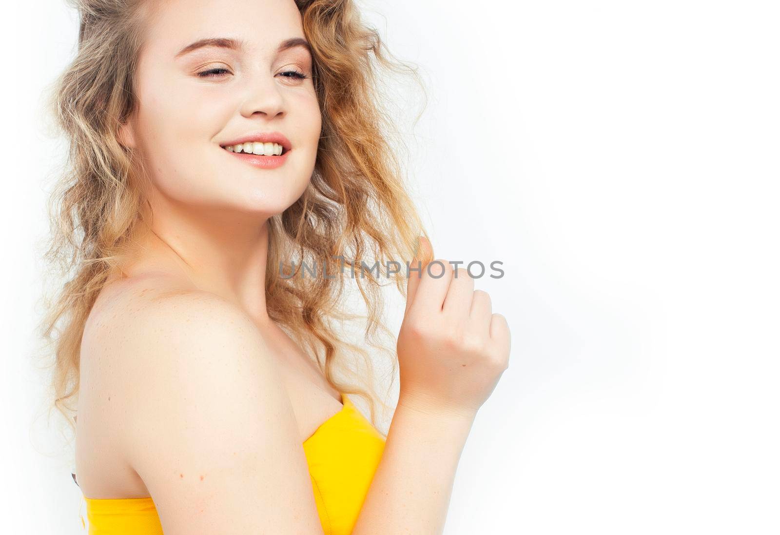 oung pretty blond girl posing happy smiling on white background isolated, lifestyle people concept close up