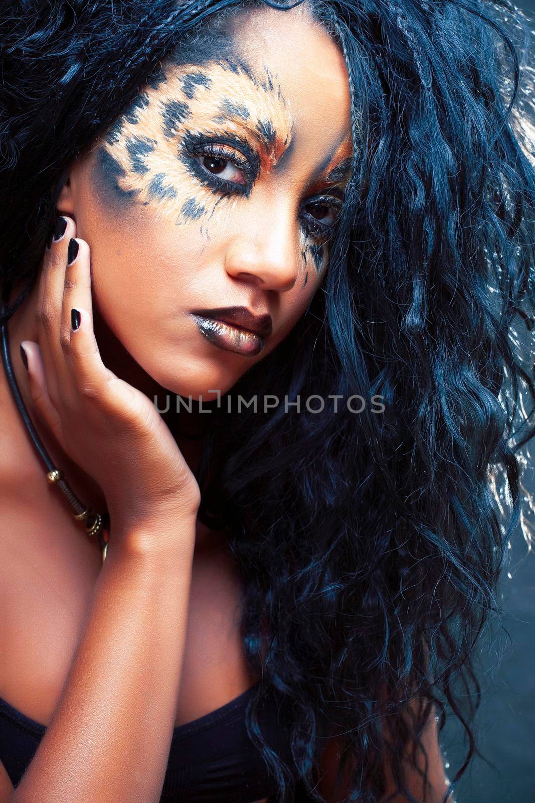beauty afro girl with cat make up, creative leopard print on face closeup halloween woman by JordanJ