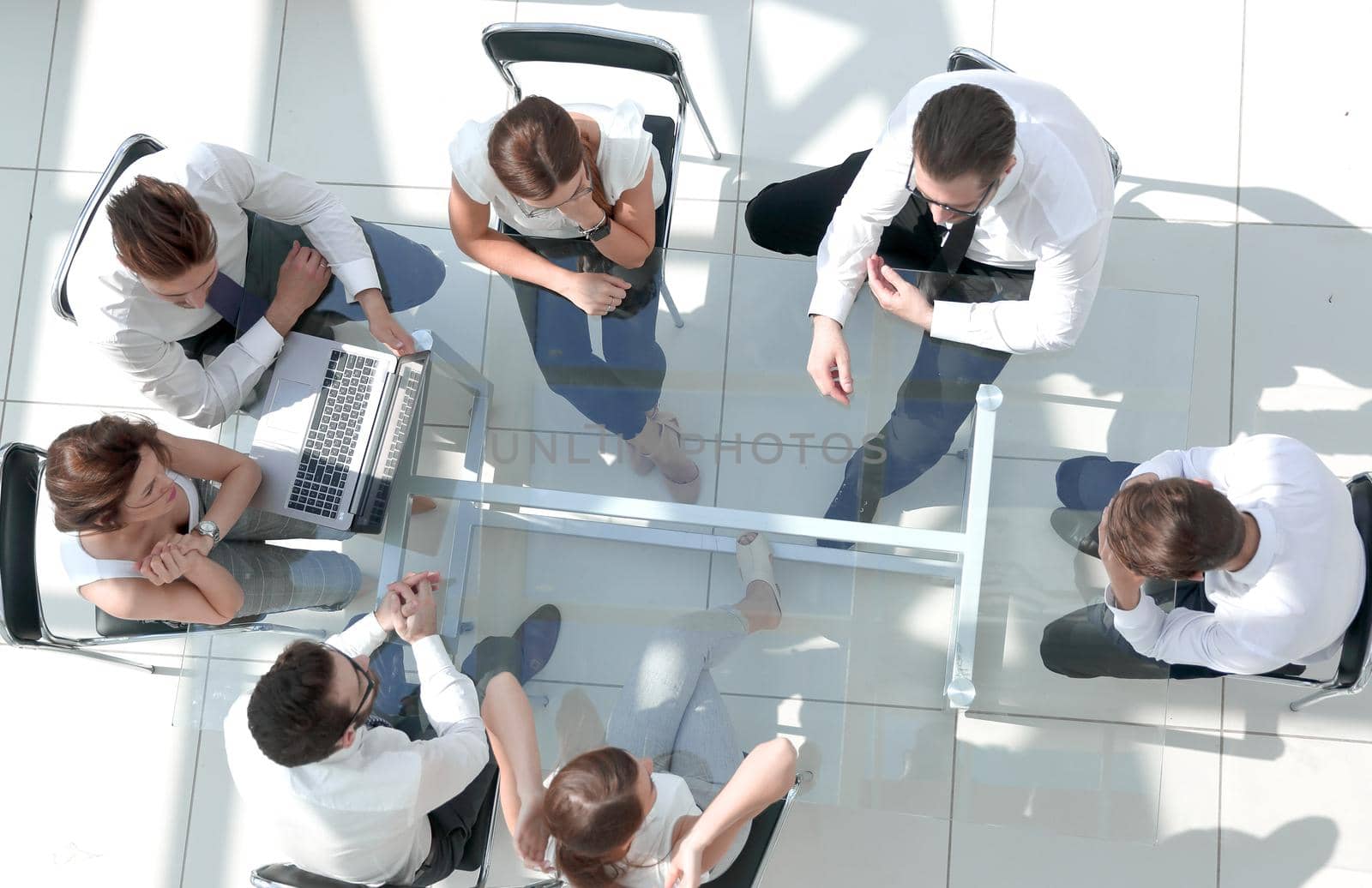 top view.business team discussing a new project at a working meeting.business concept