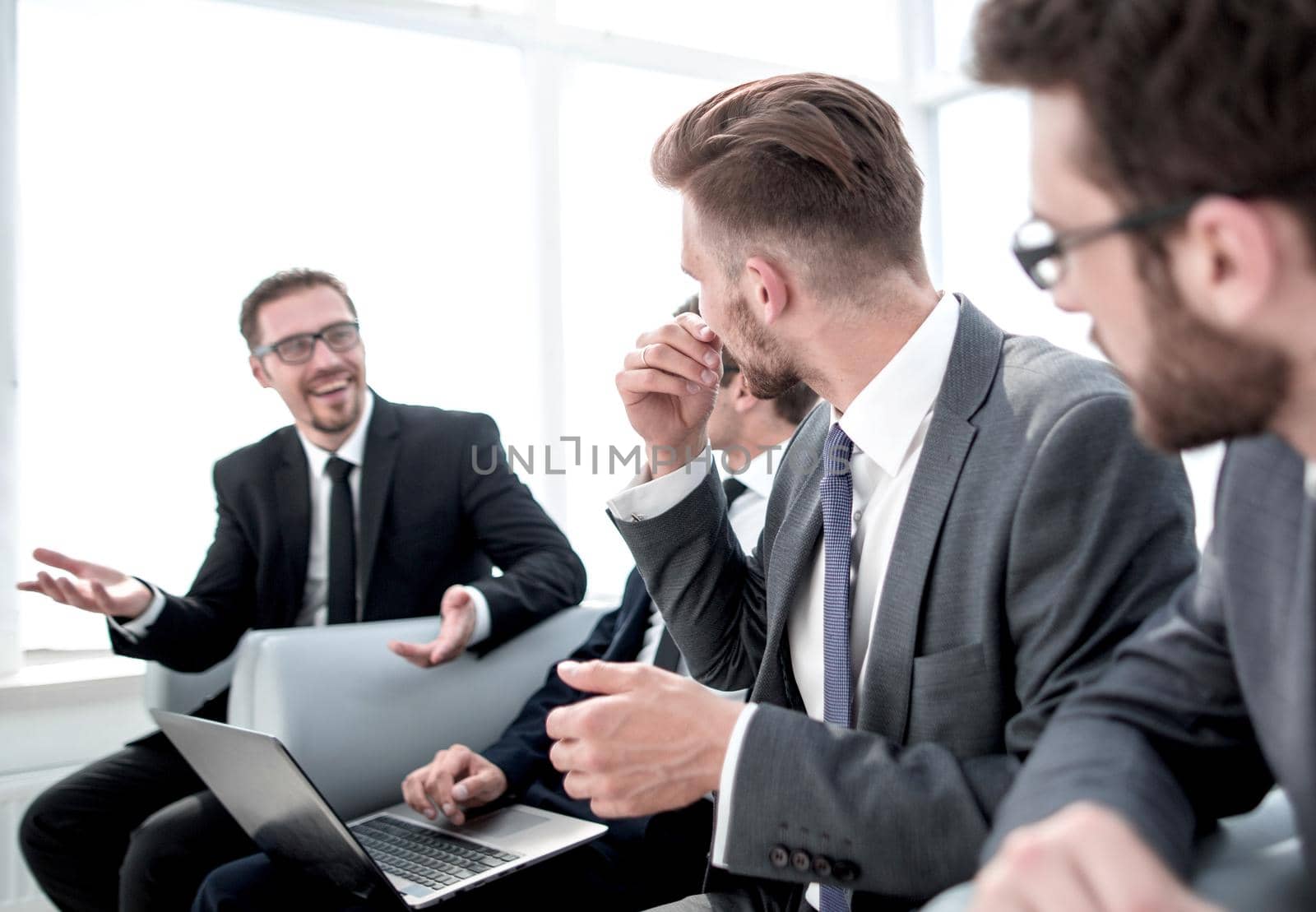 business colleagues sitting in the office waiting room .business concept