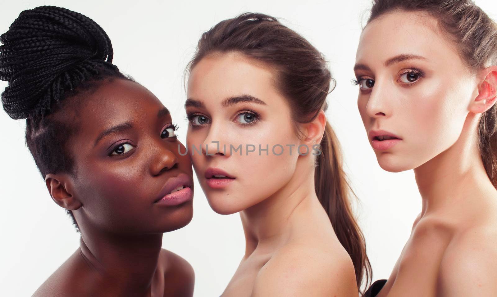 three different nation woman: african-american, caucasian together isolated on white background happy smiling, diverse type on skin, lifestyle real people concept by JordanJ