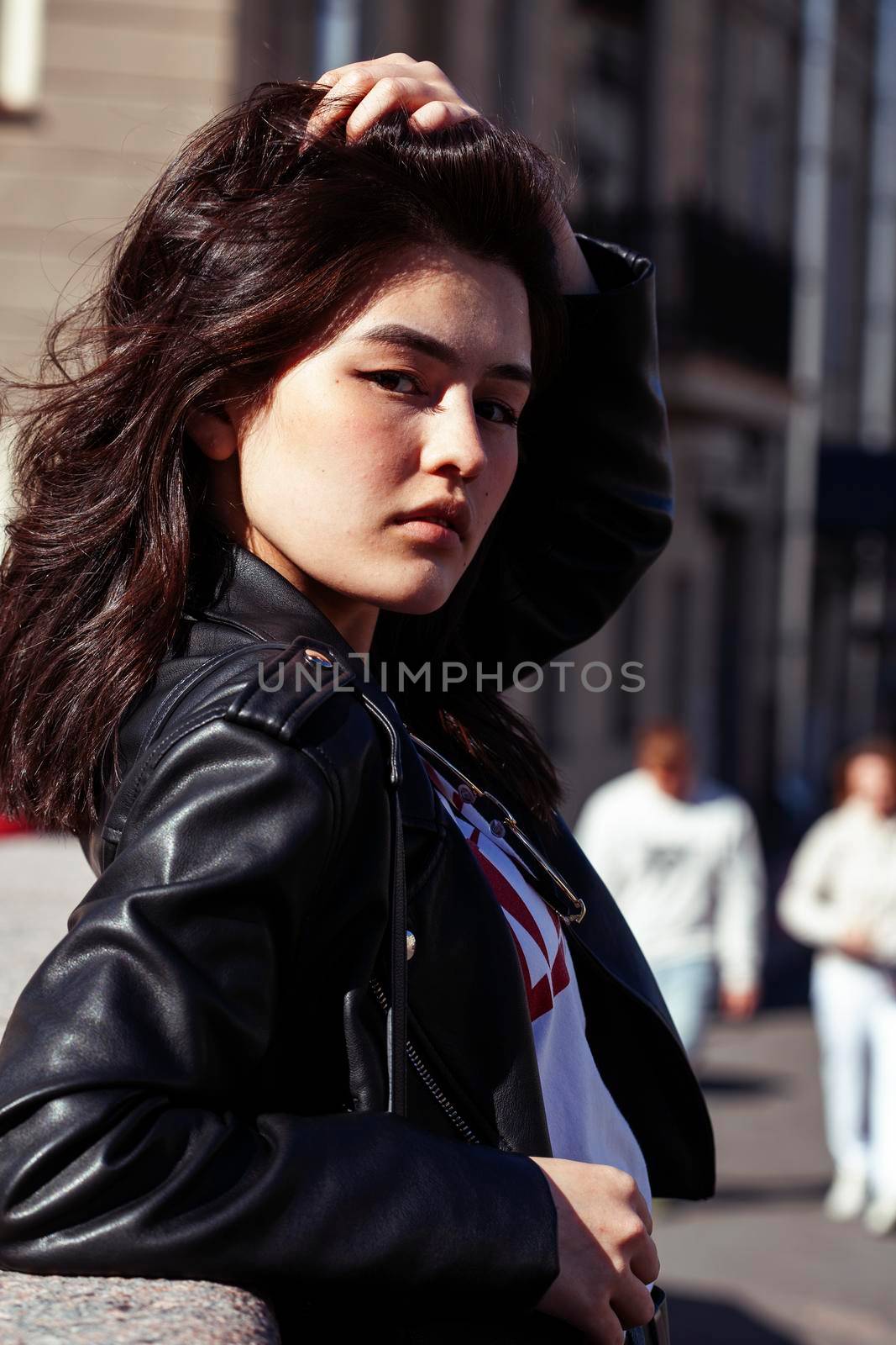 young pretty asian girl wearing sunglasses outside on big city street, lifestyle people concept close up