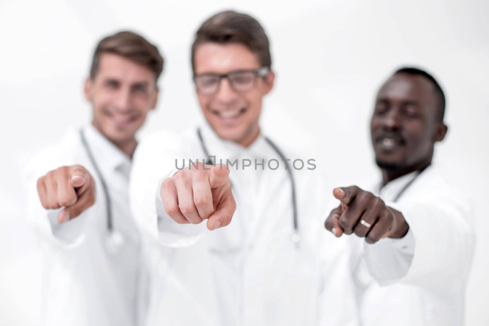 blurry image of a group of doctors pointing at you by asdf
