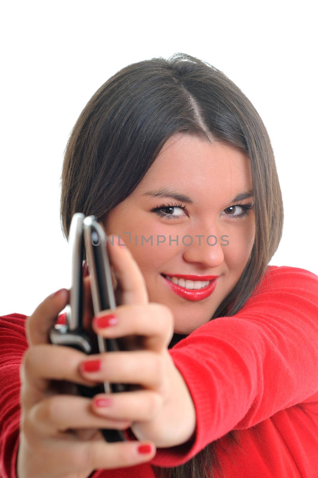 young beautiful woman in red talk on cellphone isolated