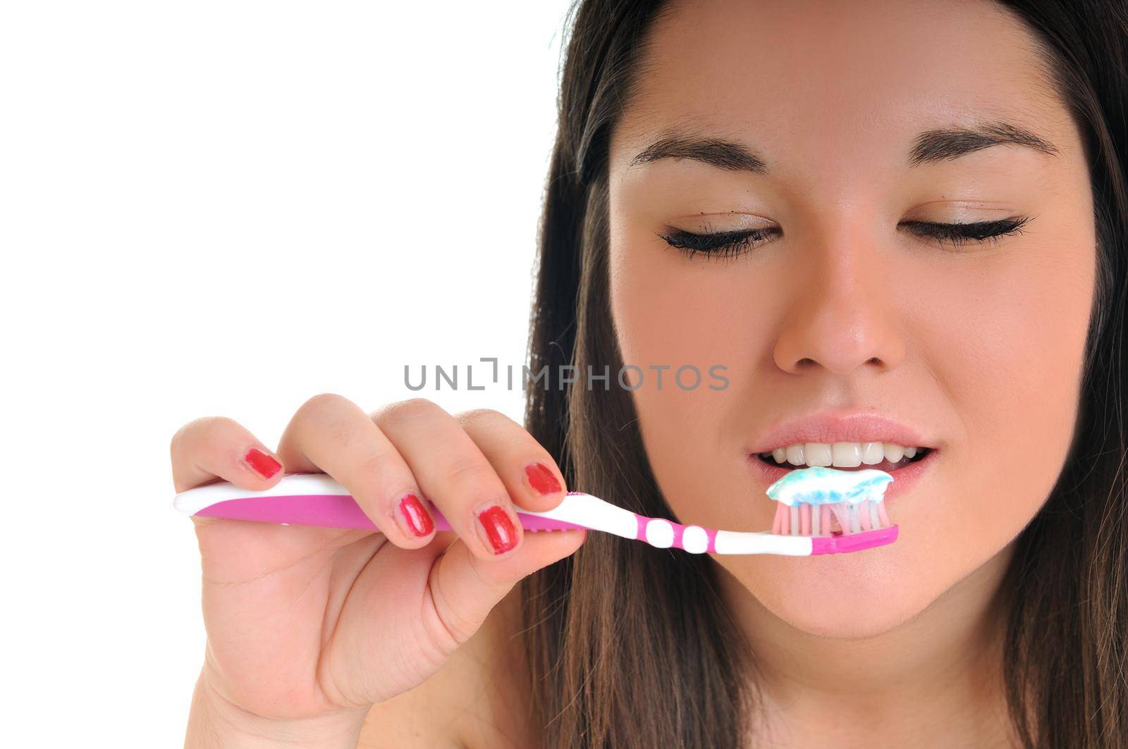 dental care concept with beautiful smilling young  woman and tooth brush