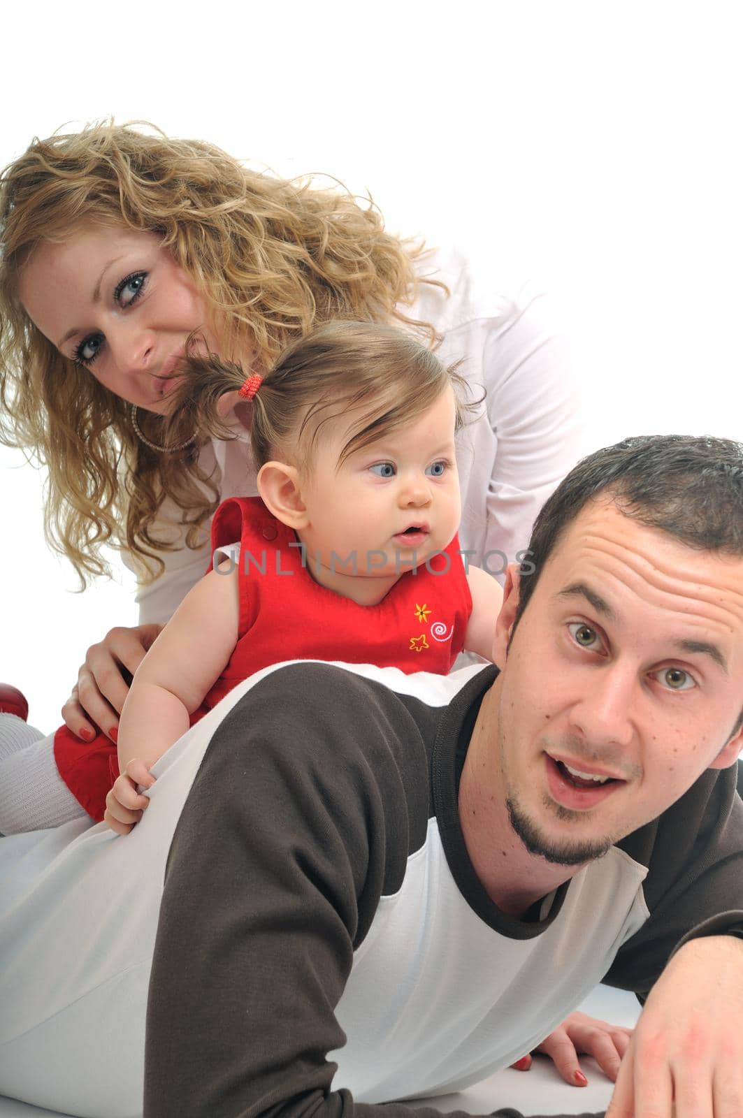 young happy family with beautiful baby isolated on white