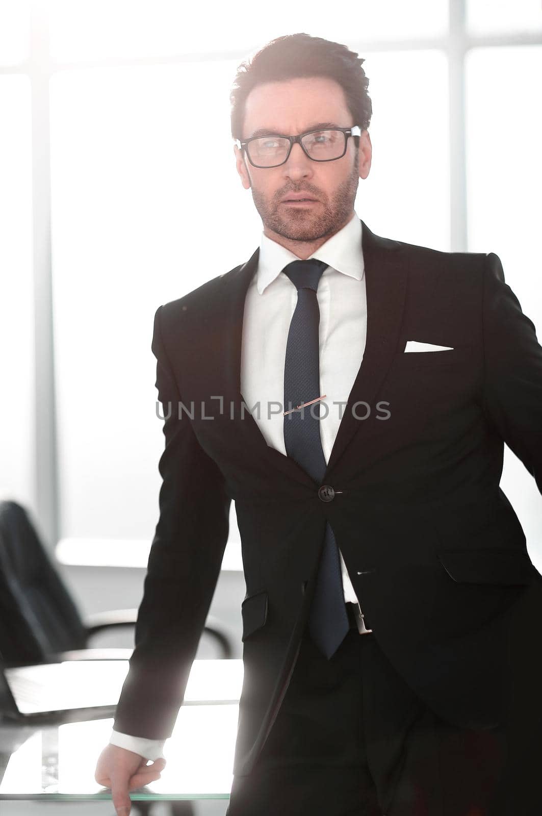 close up.confident businessman standing in the office.business people