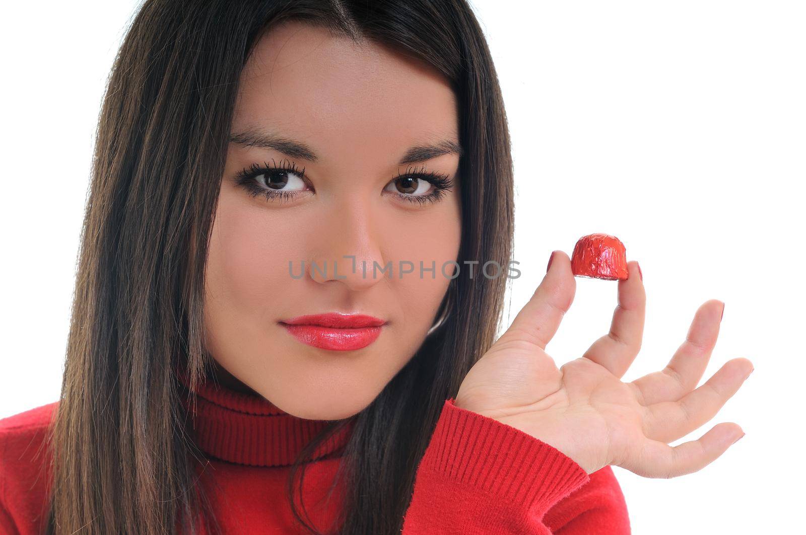 young woman isolated on white in red shirt eat sweet tasty chocolate