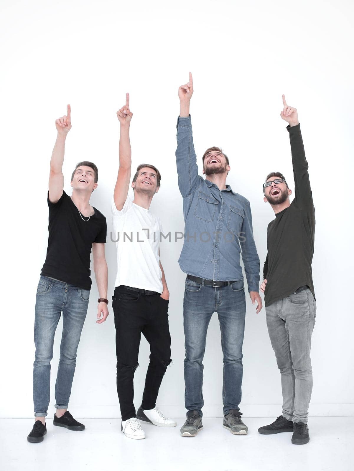 group of young people points up.isolated on white background