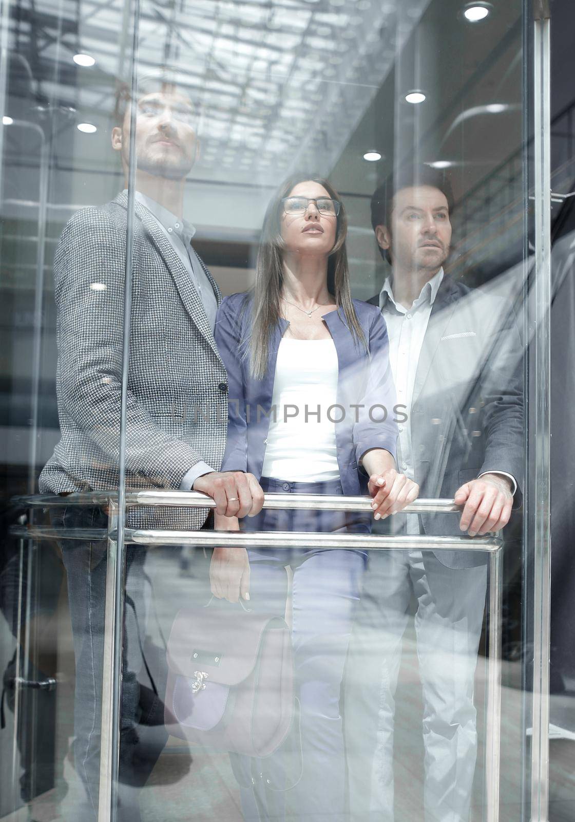 group of business people standing in the Elevator.business concept