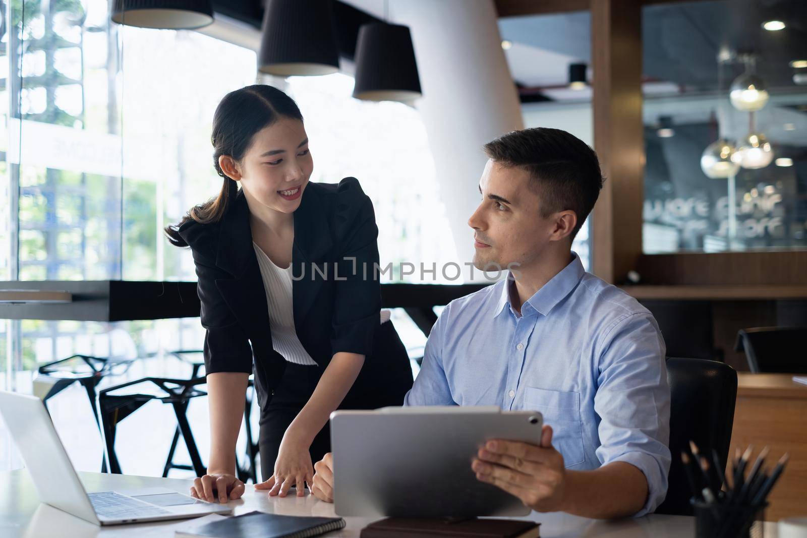 Business woman and Accountant brainstorming or discussing about fund investment and finance