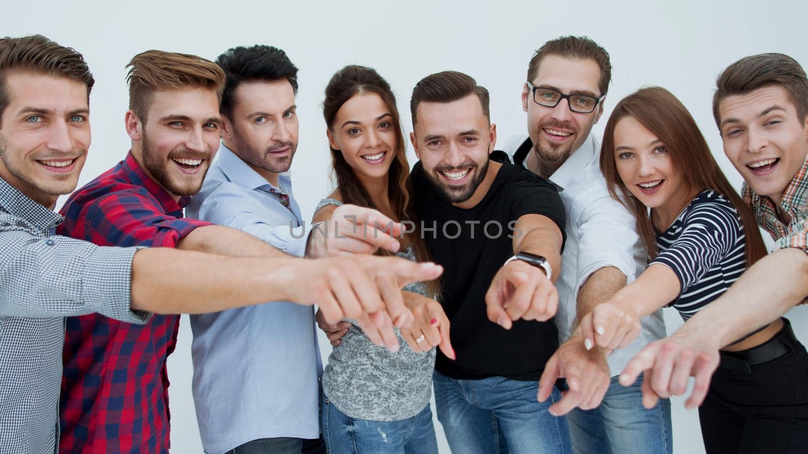 close up.a creative group of young people pointing at you by asdf