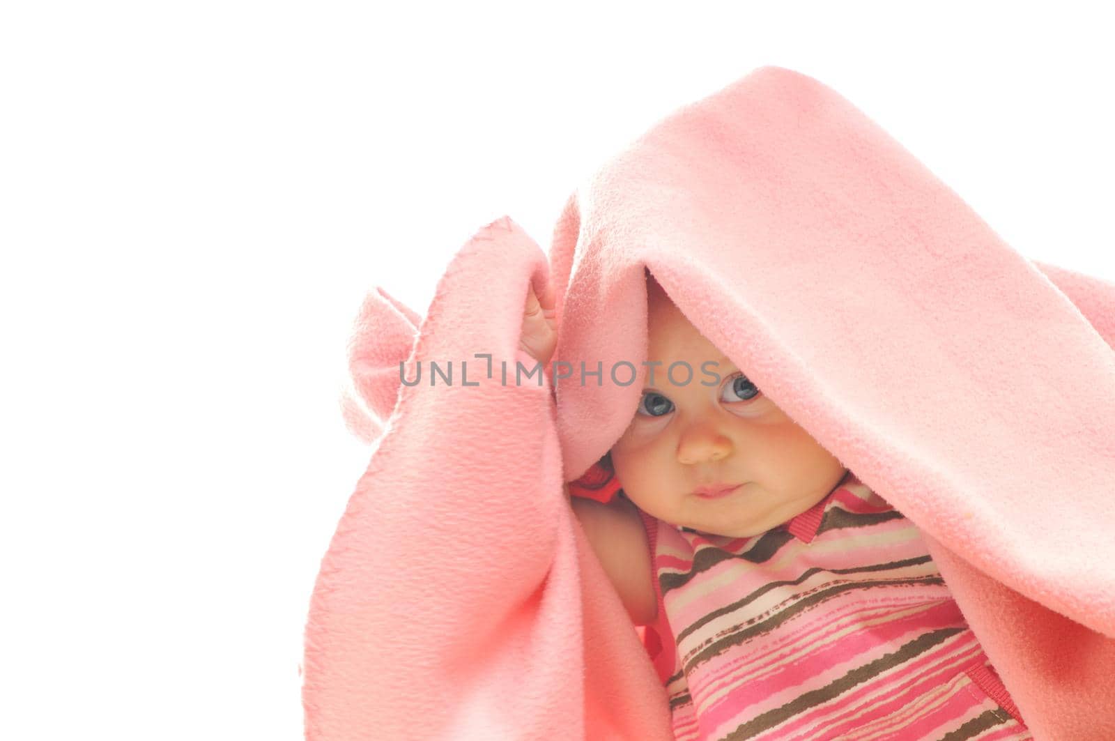 cute little baby isolated on white under blanket alone