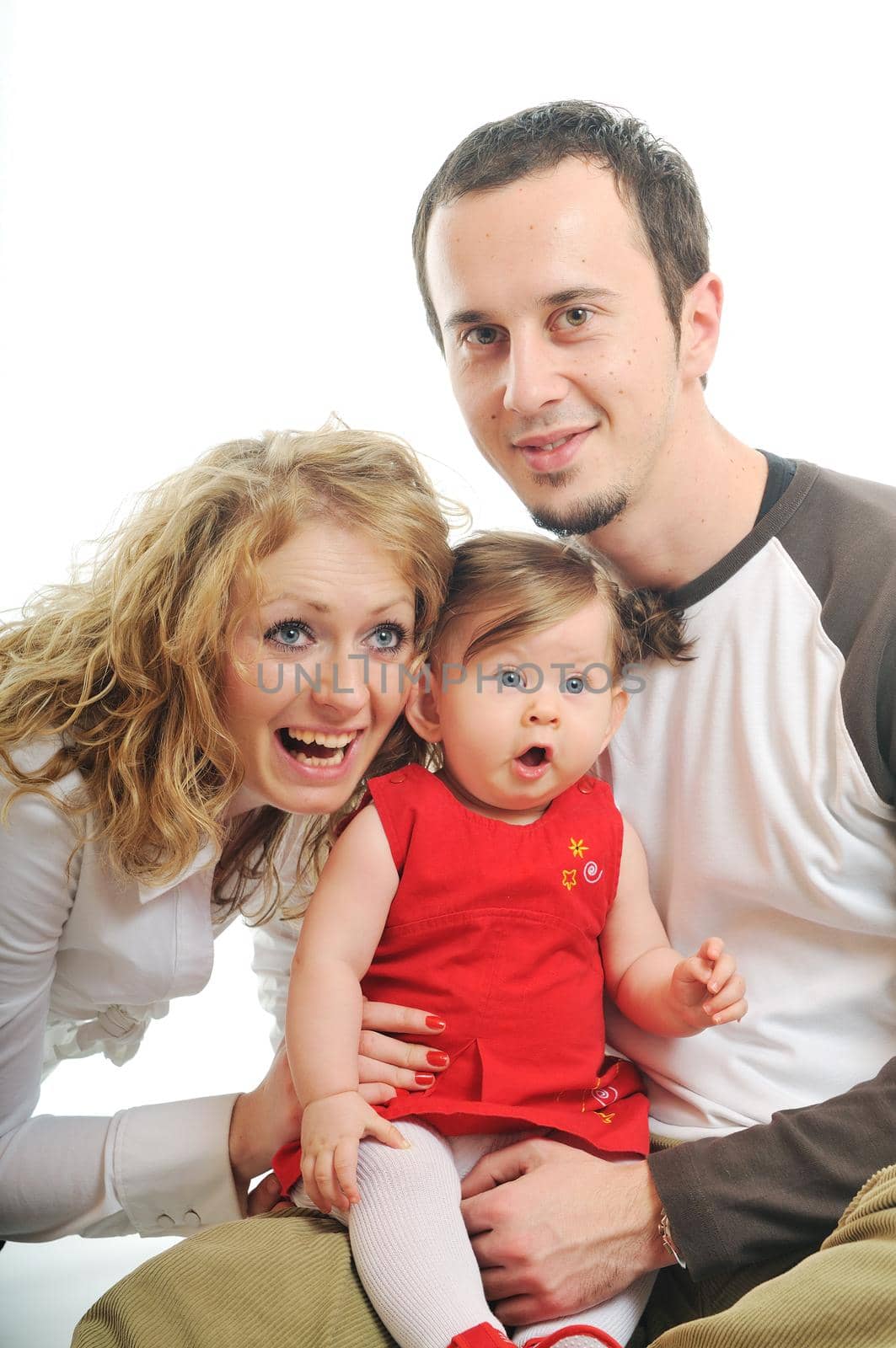 young happy family with beautiful baby playing and smile  isolated on white