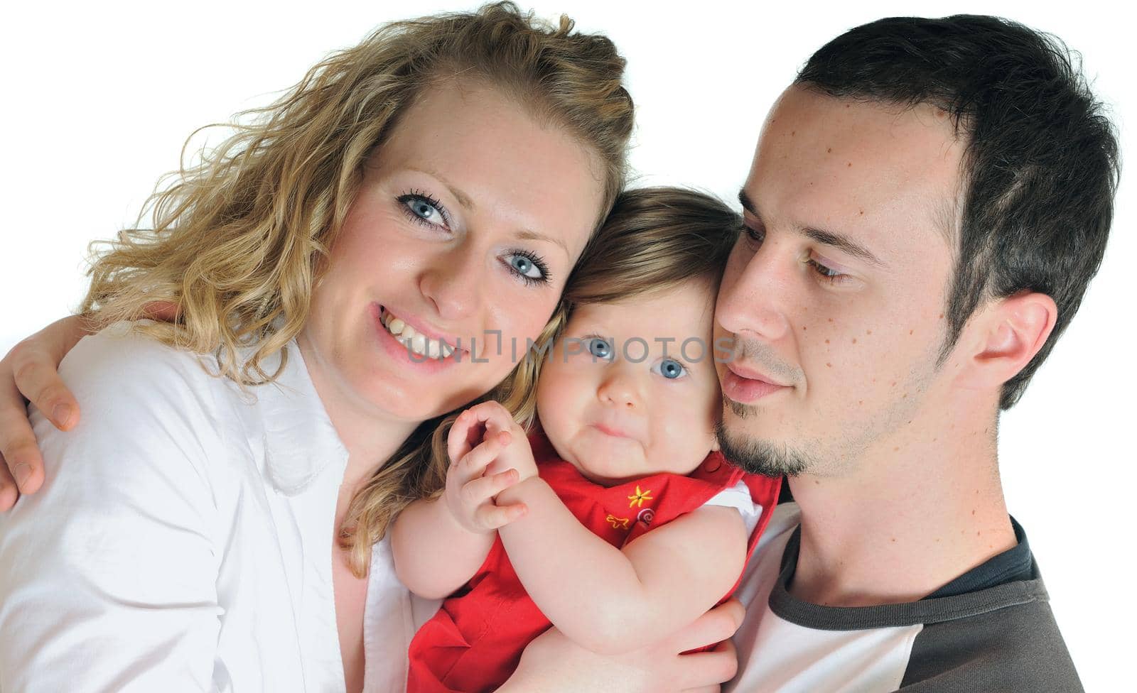 young happy family with beautiful baby playing and smile  isolated on white in studio 