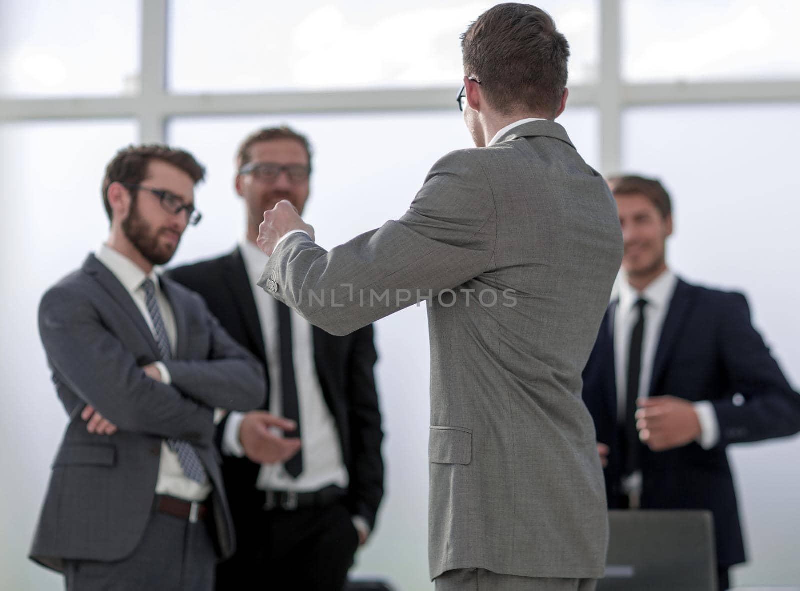 business background.a group of business colleagues standing in the office.photo with copy space