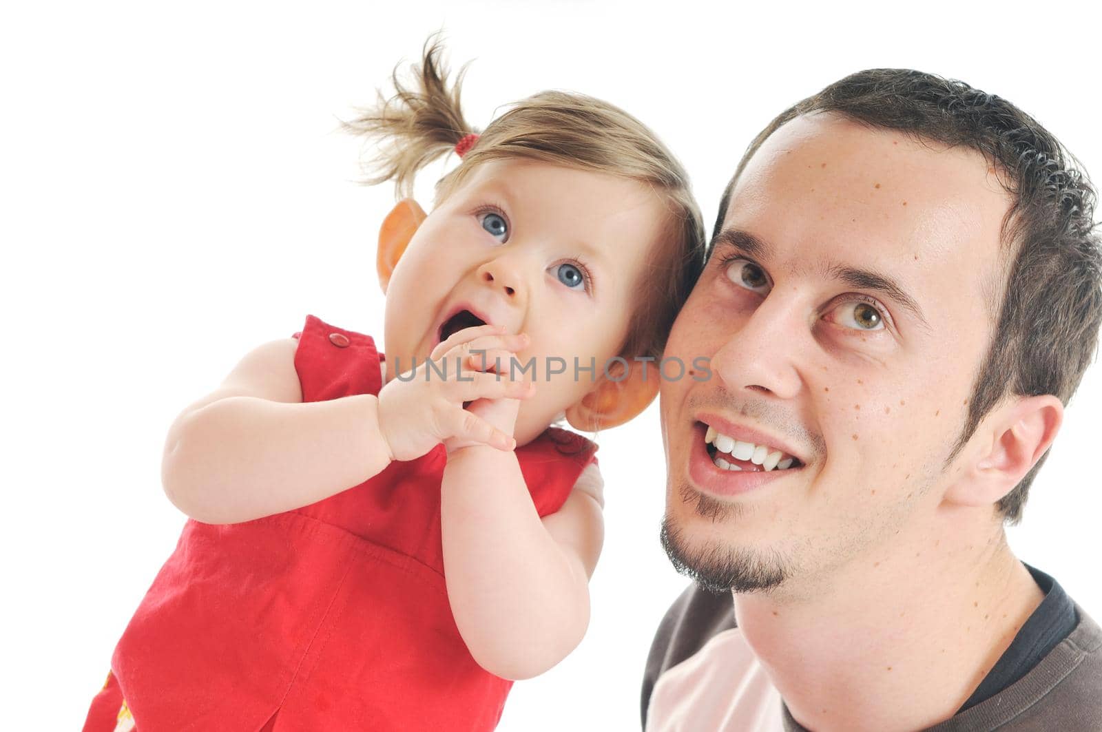 young male man parent play with beautiful little baby