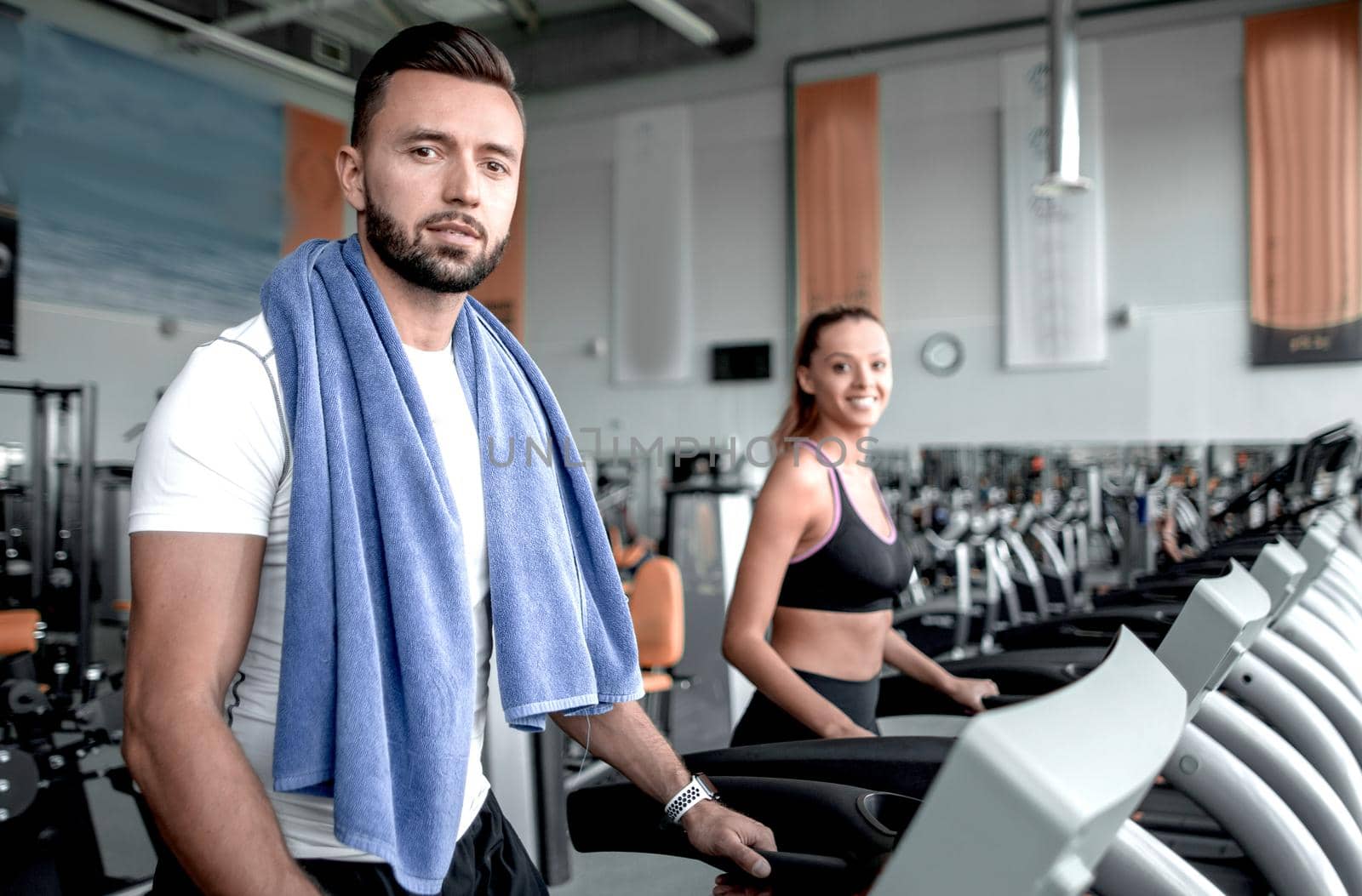 close up. an attractive man works in a modern gym. healthy lifestyle