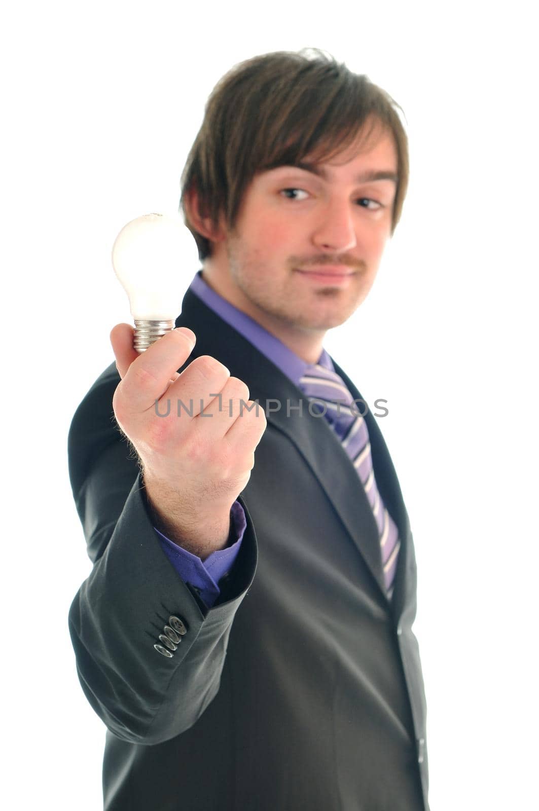 one business man isolated on white hold bul with idea and inovation concept