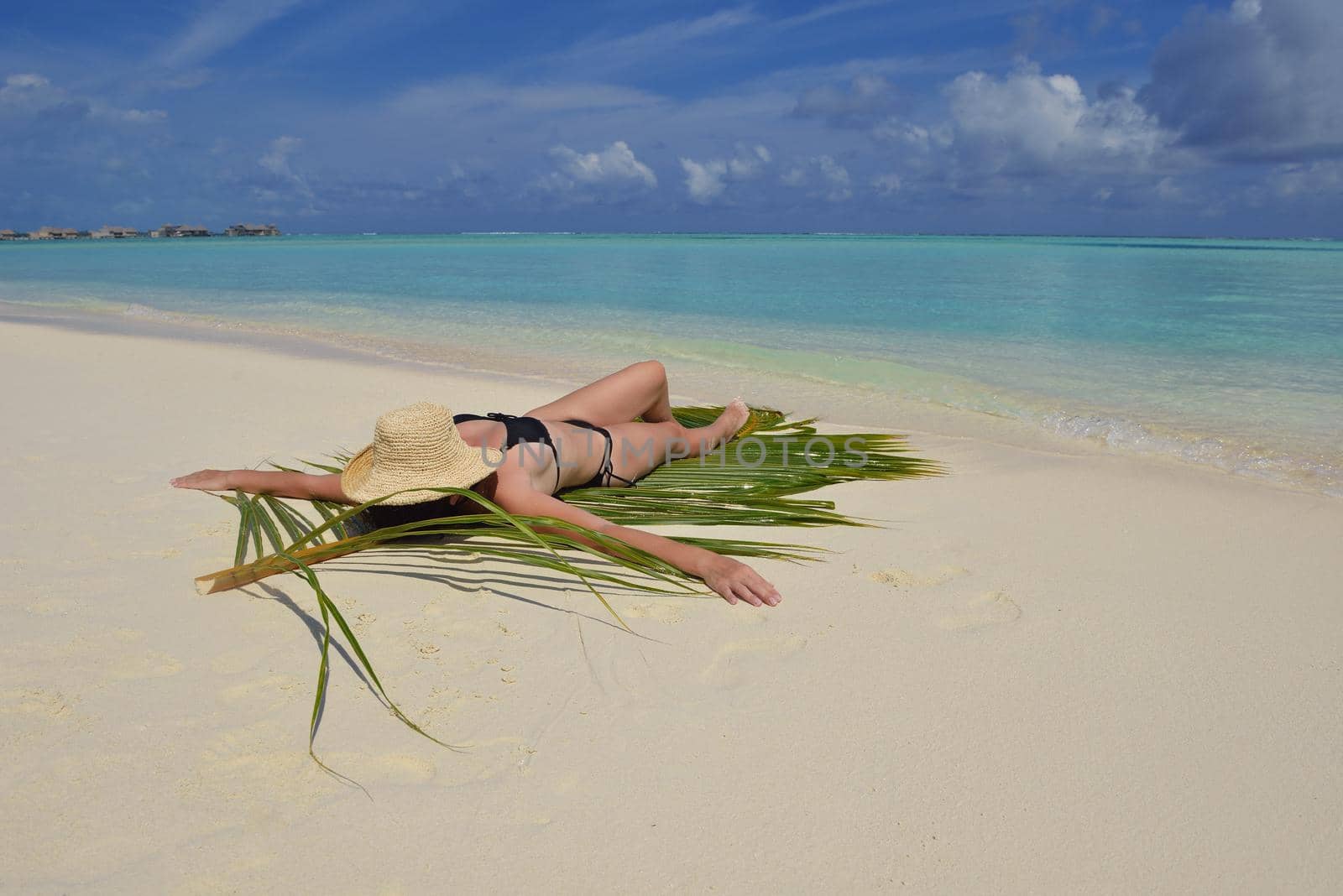 happy young woman on summer vacation on beautiful tropical beach have fun and relax