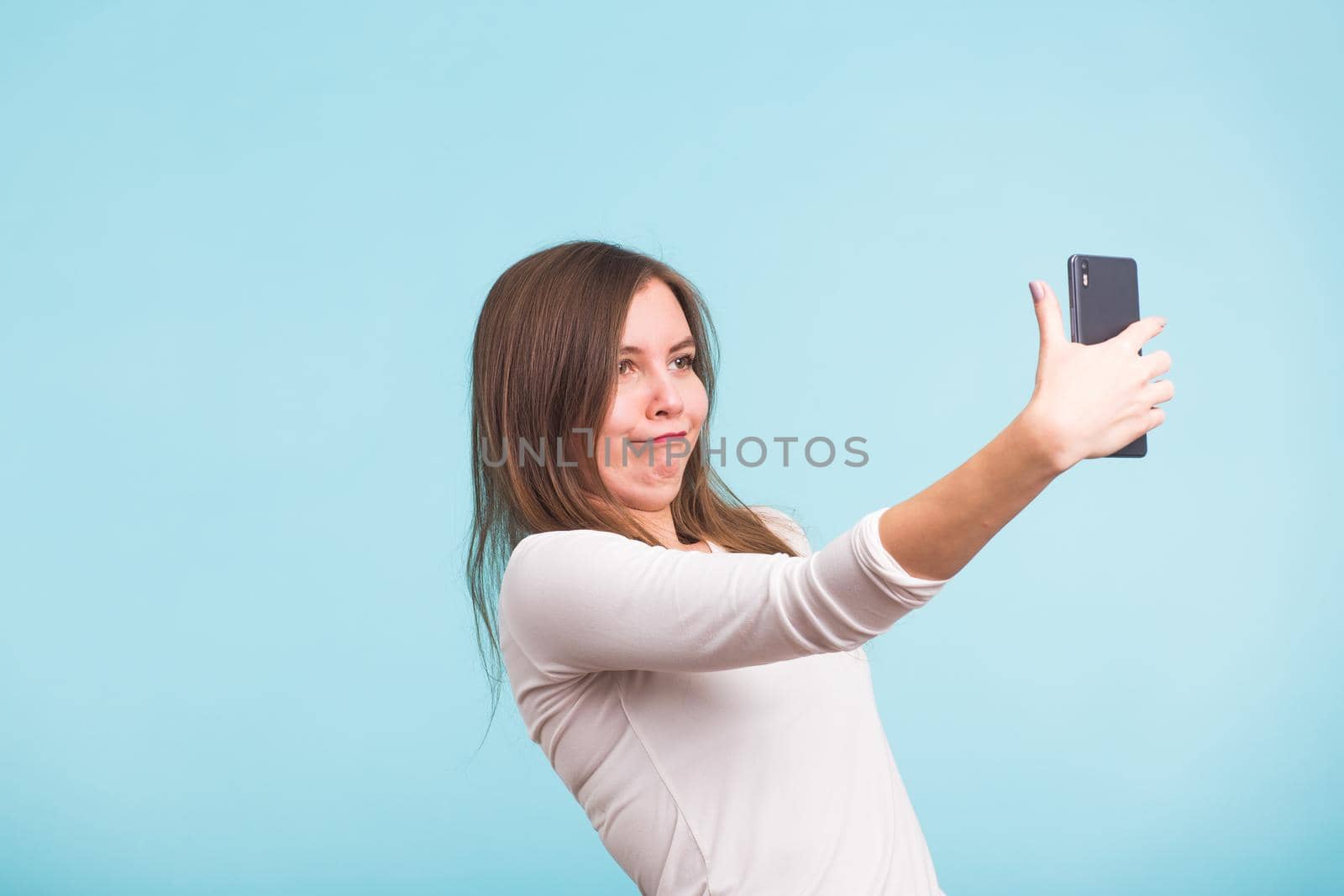 fool crazy woman make selfie. happy expression.