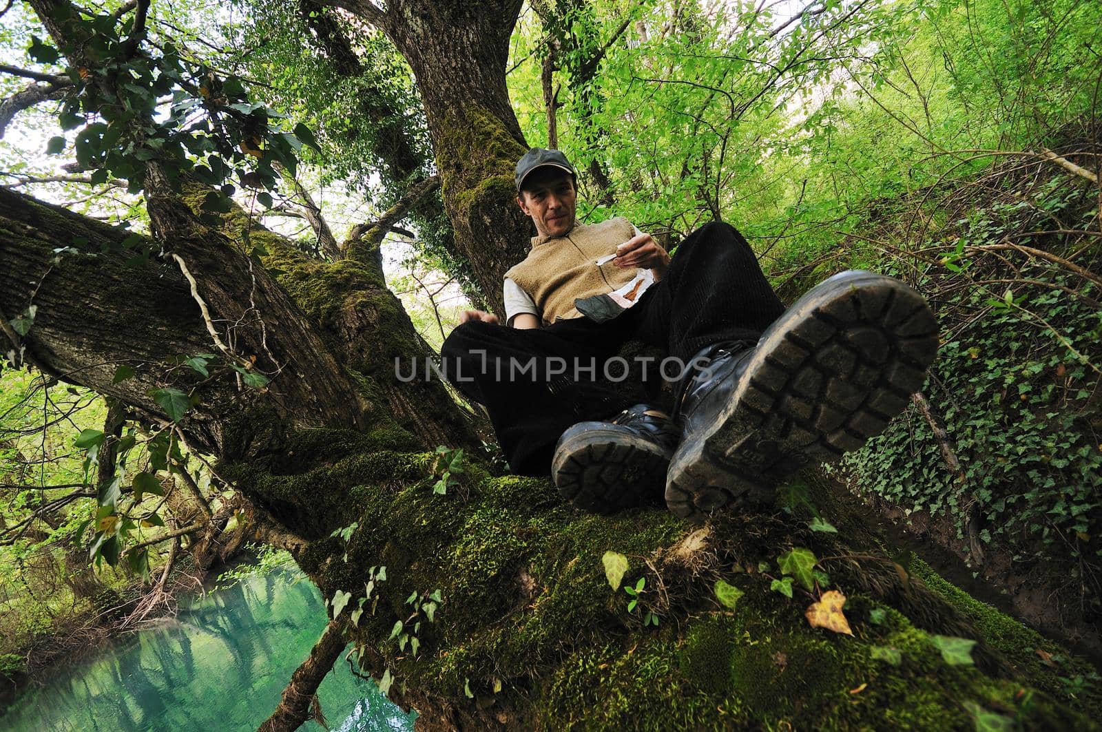 man outdoor in nature relaxing 