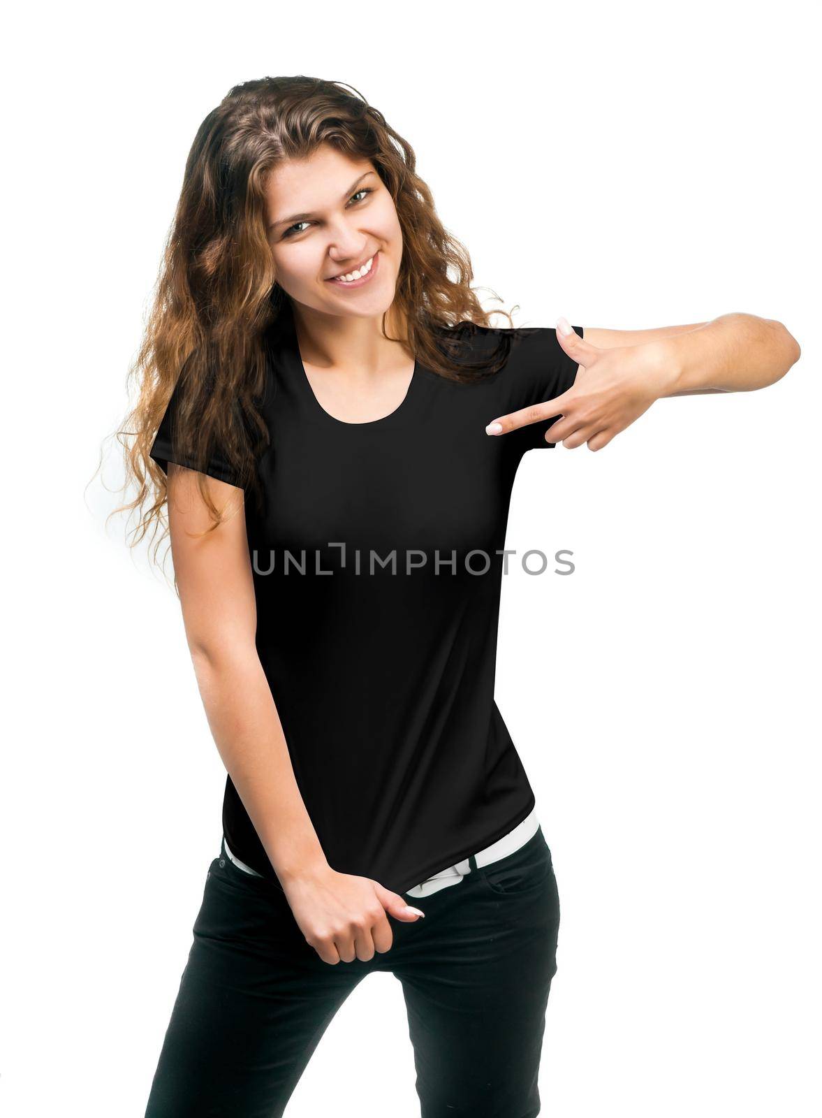 Young beautiful girl posing with blank black shirts. Ready for your design