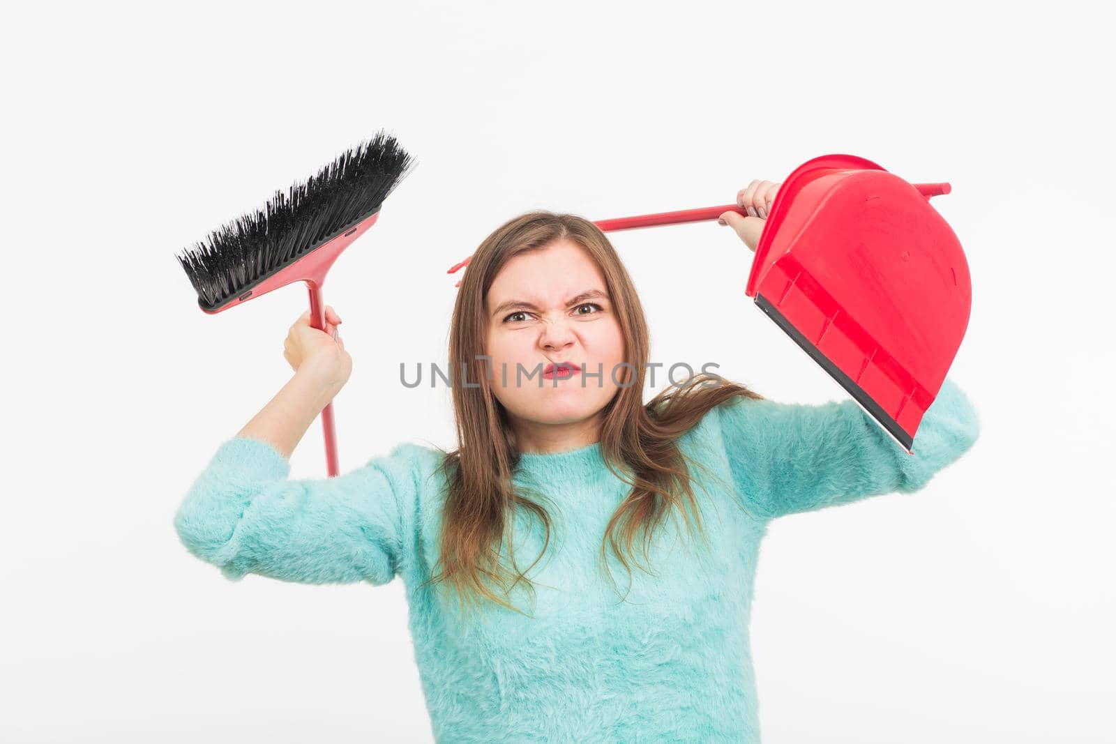 Woman or housewife holding broom, tired to cleaning, on white background, isolated with copy space