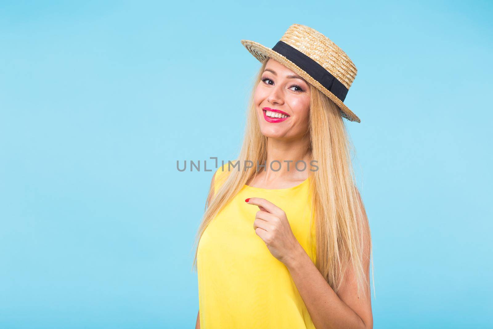 Young woman fashion lookbook model studio portrait on blue background with copyspace by Satura86