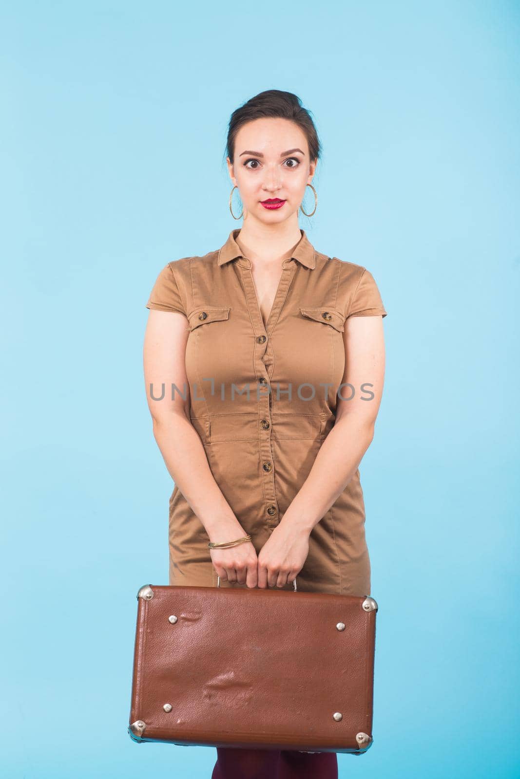 Portrait of a beautiful young woman in retro style