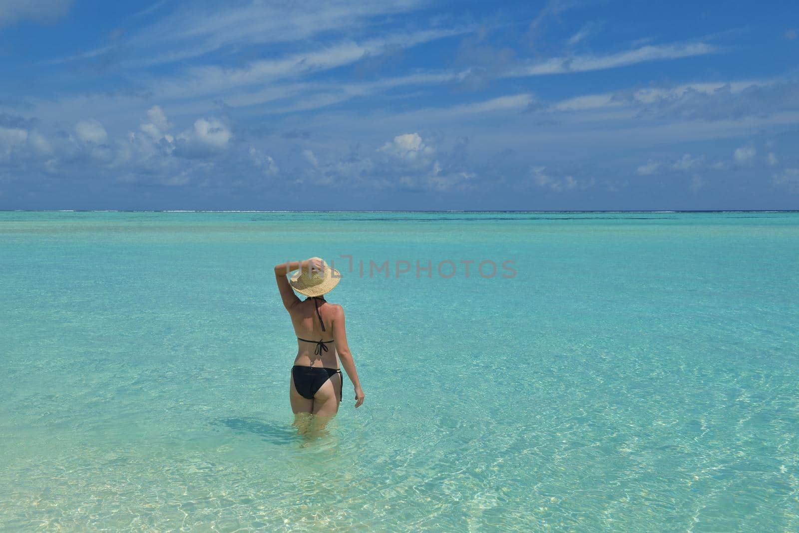 happy young woman on summer vacation on beautiful tropical beach have fun enjoy and relax