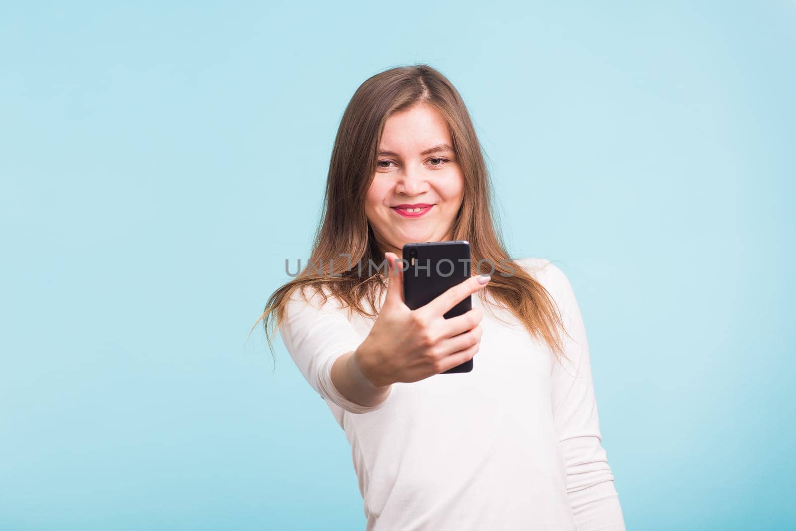 fool crazy woman make selfie. happy expression.