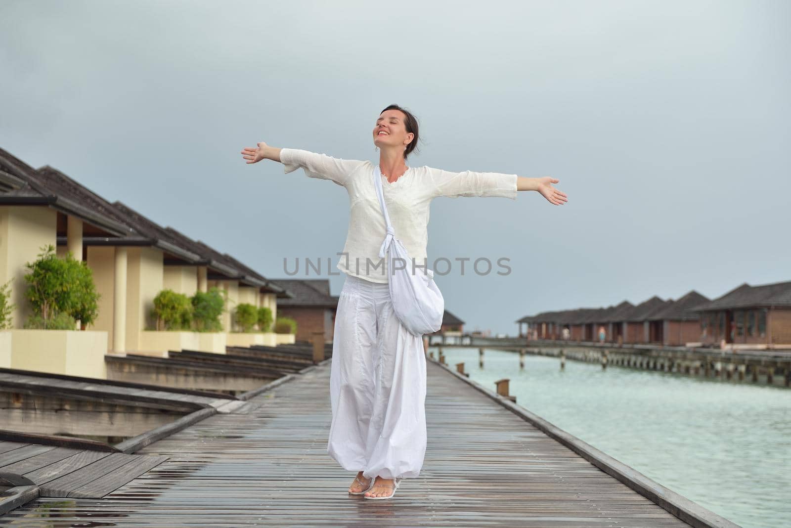 young woman relax on cloudy summer day and bad weather