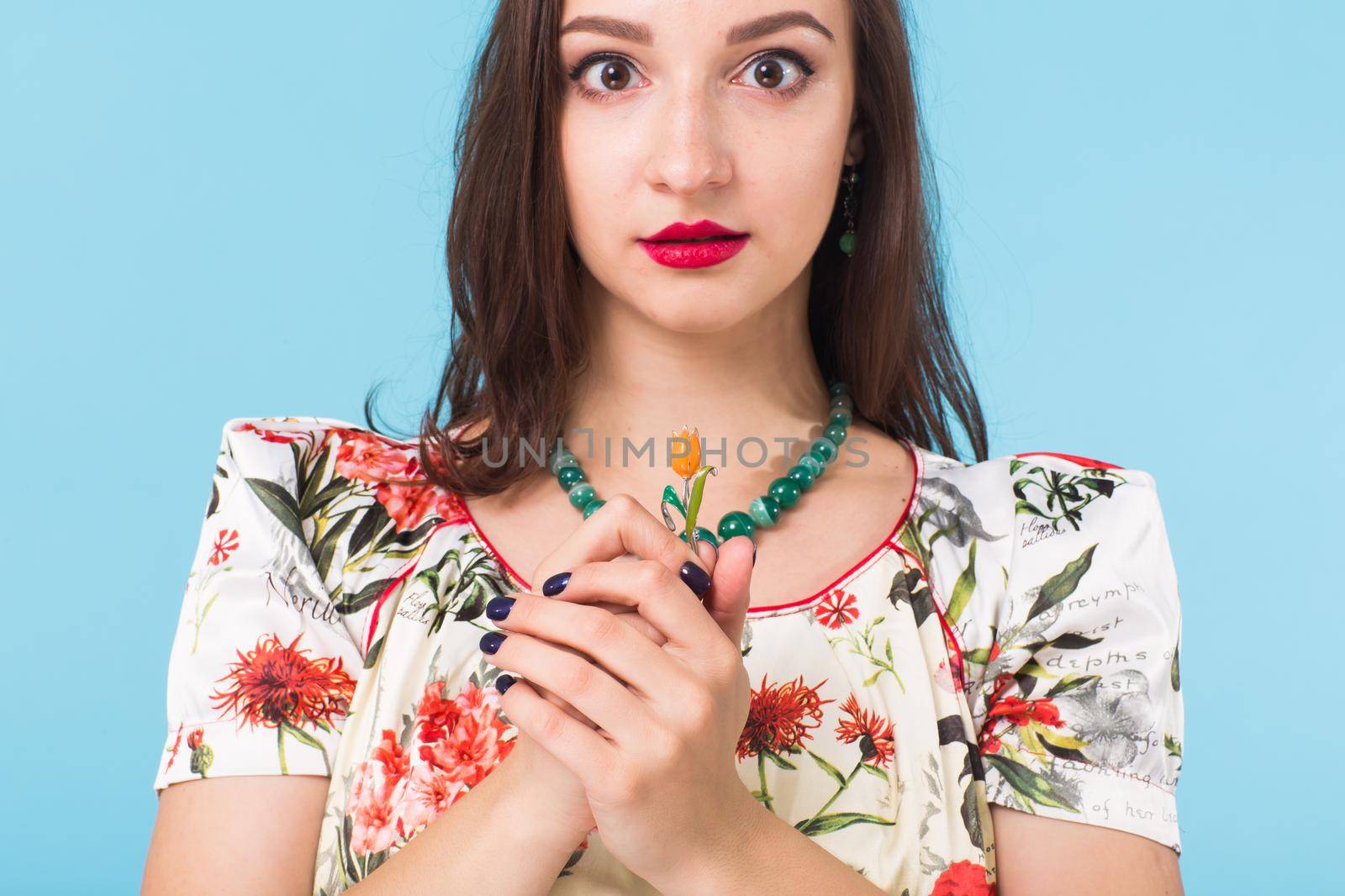 Portrait of young beautiful woman cheerfuly smiling looking at camera. Isolated on pastel blue background. Copy space. by Satura86