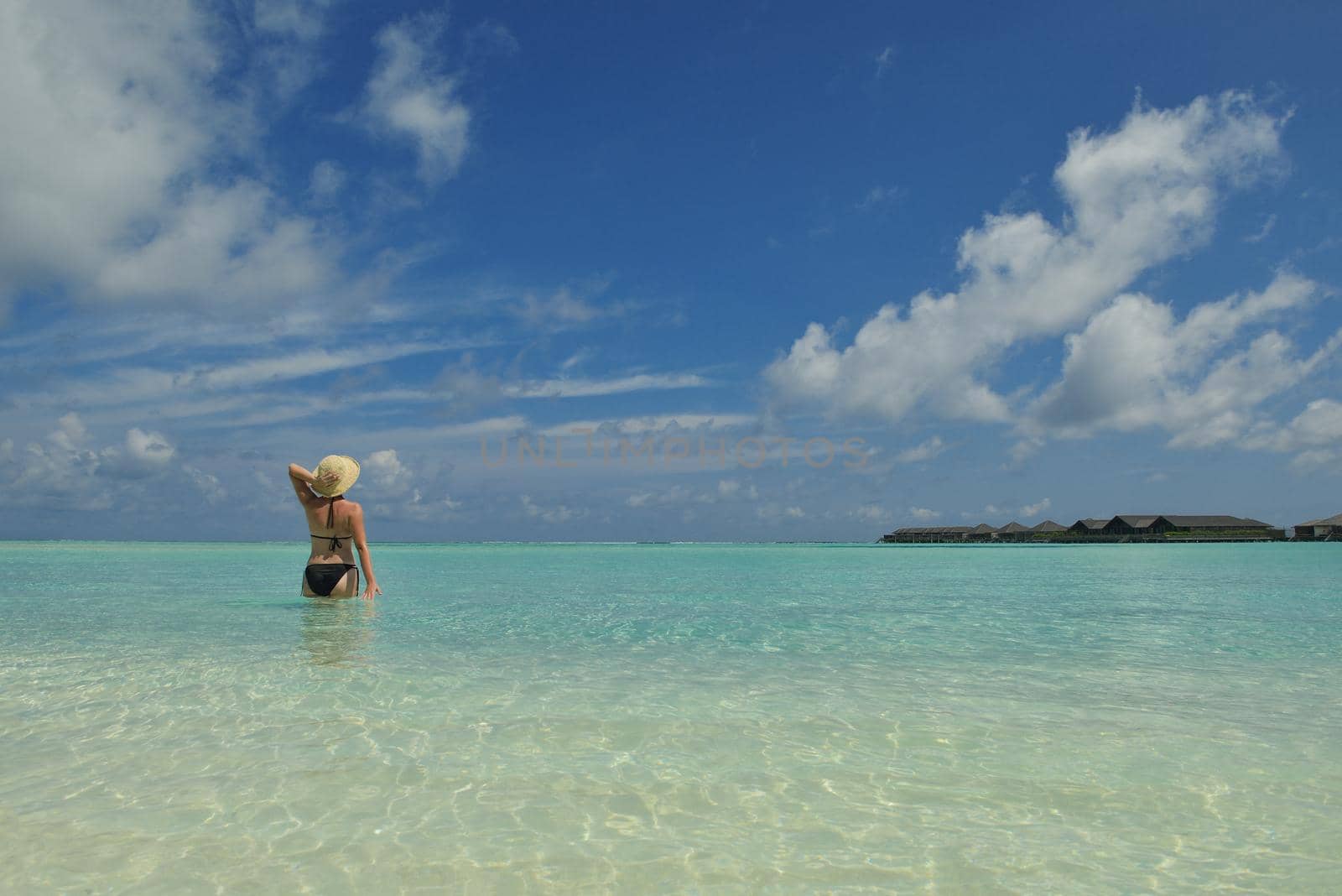 happy young woman on summer vacation on beautiful tropical beach have fun enjoy and relax