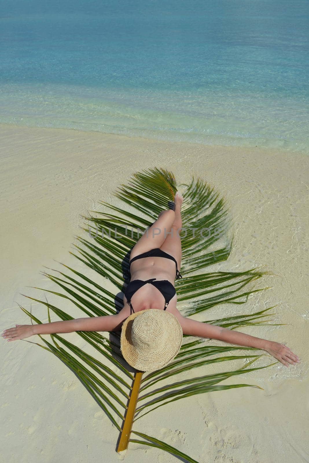 happy young woman on summer vacation on beautiful tropical beach have fun enjoy and relax