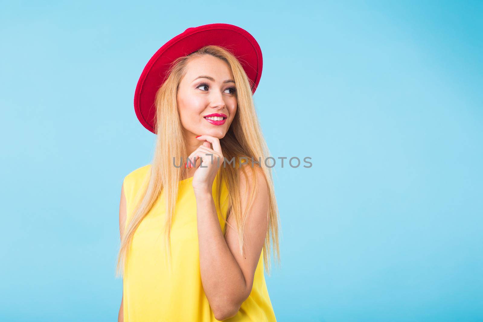 Young woman fashion lookbook model studio portrait on blue background. by Satura86