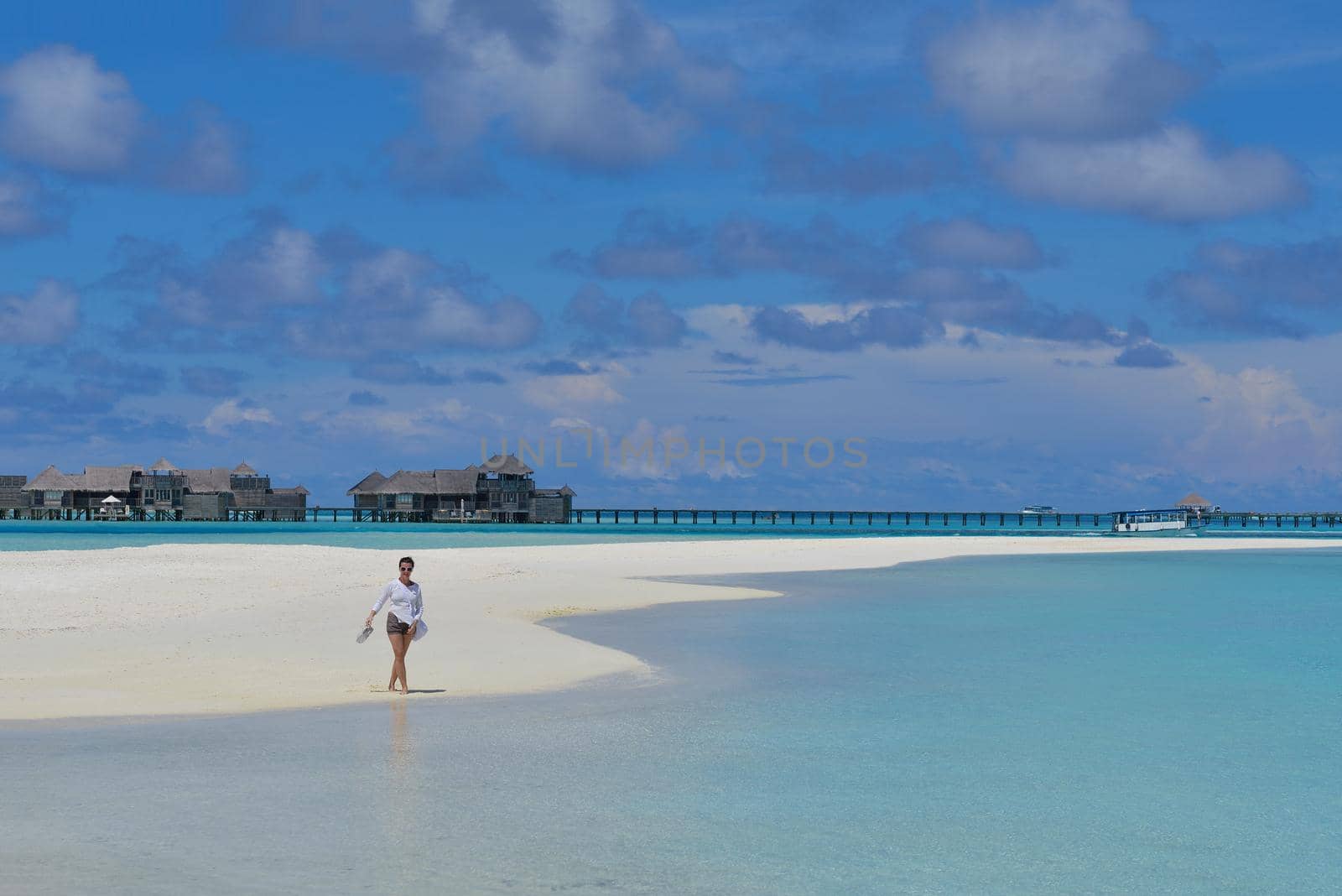 happy young woman on summer vacation on beautiful tropical beach have fun enjoy and relax