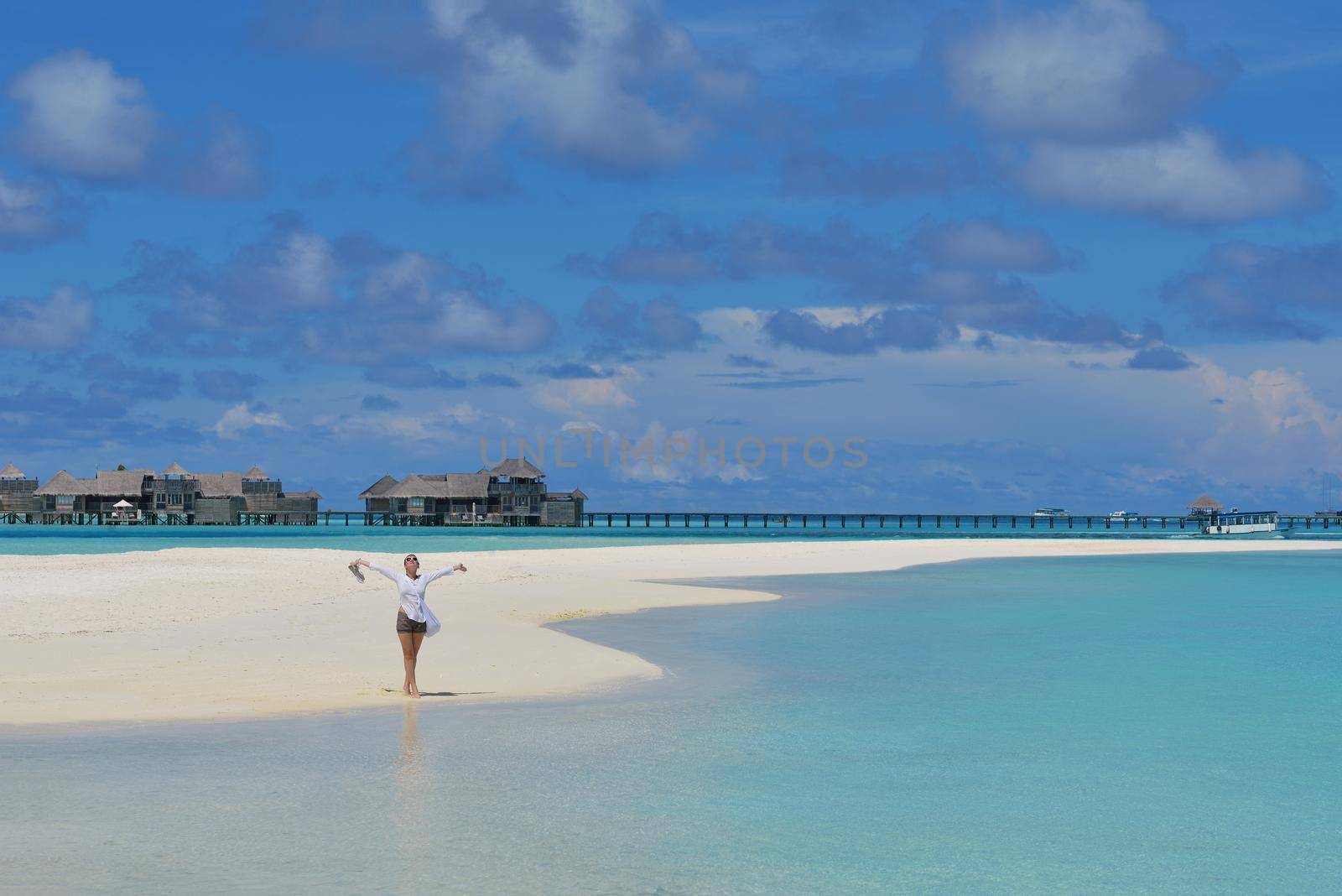 happy young woman on summer vacation on beautiful tropical beach have fun and relax