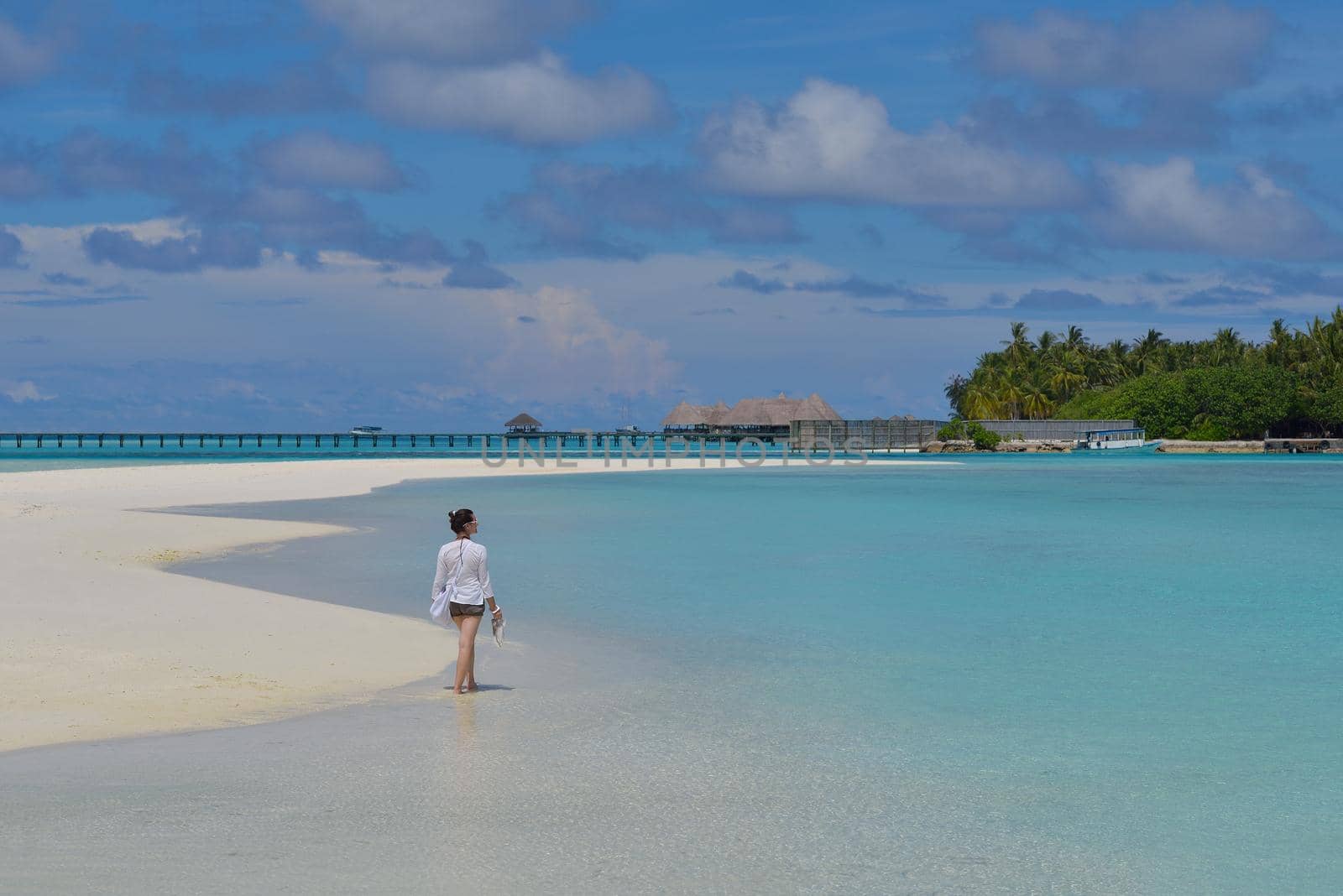 happy young woman on summer vacation on beautiful tropical beach have fun enjoy and relax