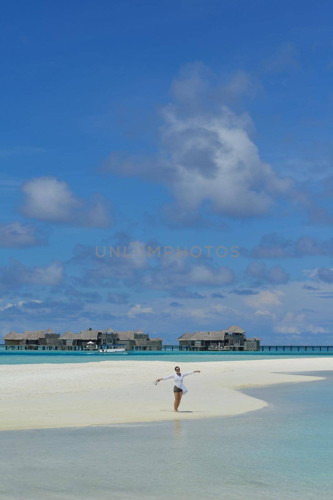 happy young woman on summer vacation on beautiful tropical beach have fun enjoy and relax