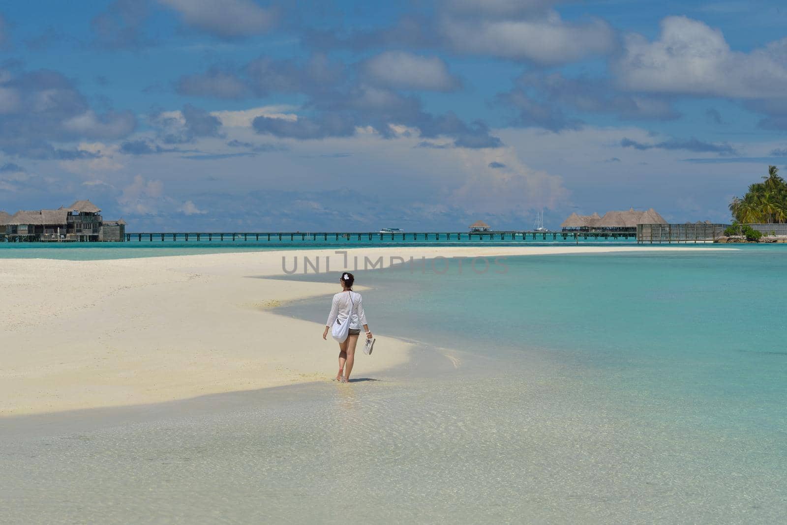 happy young woman on summer vacation on beautiful tropical beach have fun enjoy and relax