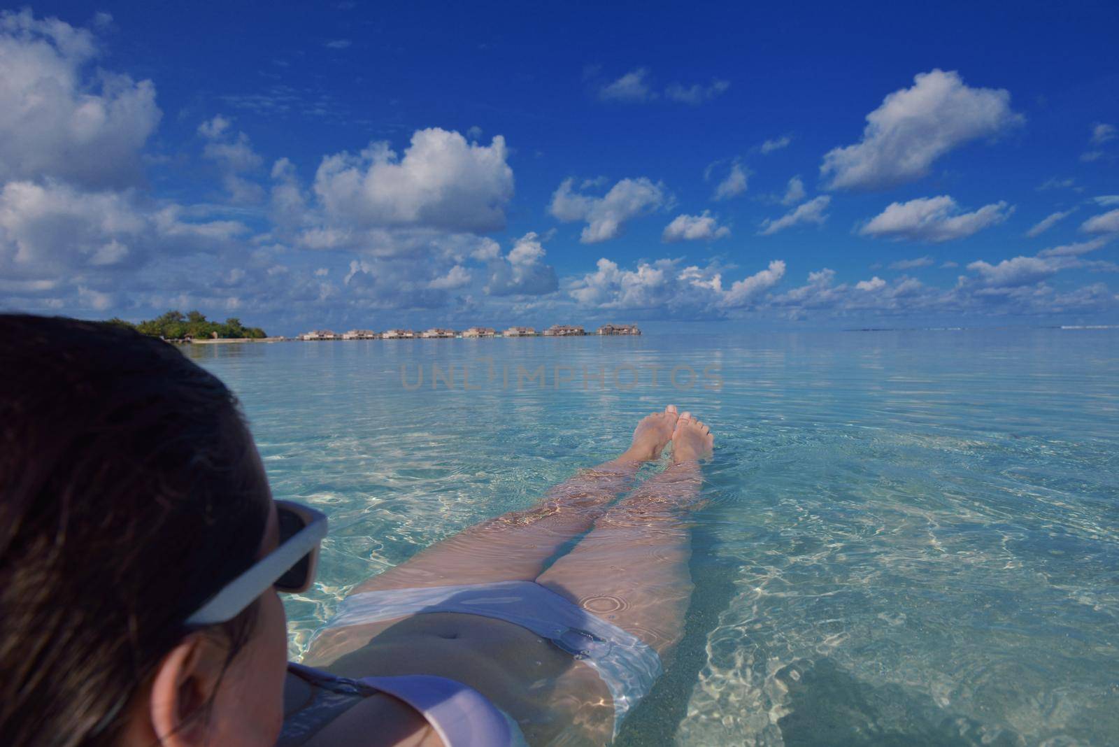 happy young woman on summer vacation on beautiful tropical beach have fun and relax