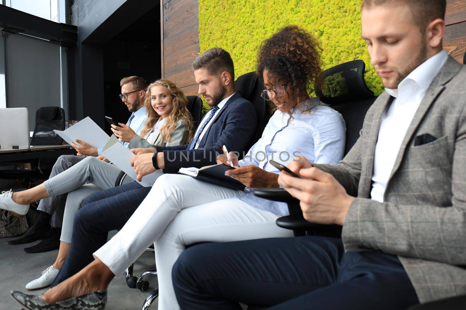 Modern business people waiting for job interview.