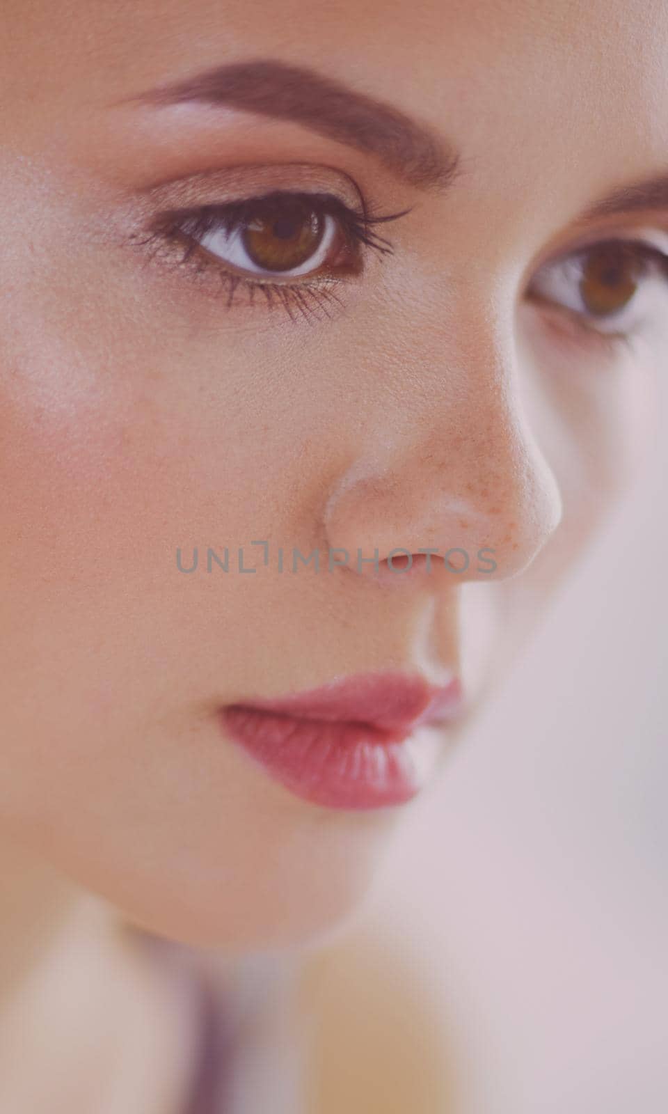Beauty portrait of female face with natural skin.