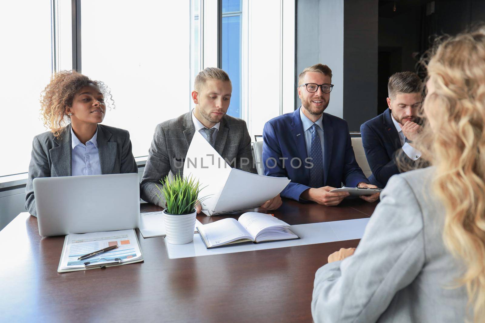 Job interview with the employer, businessman listen to candidate answers