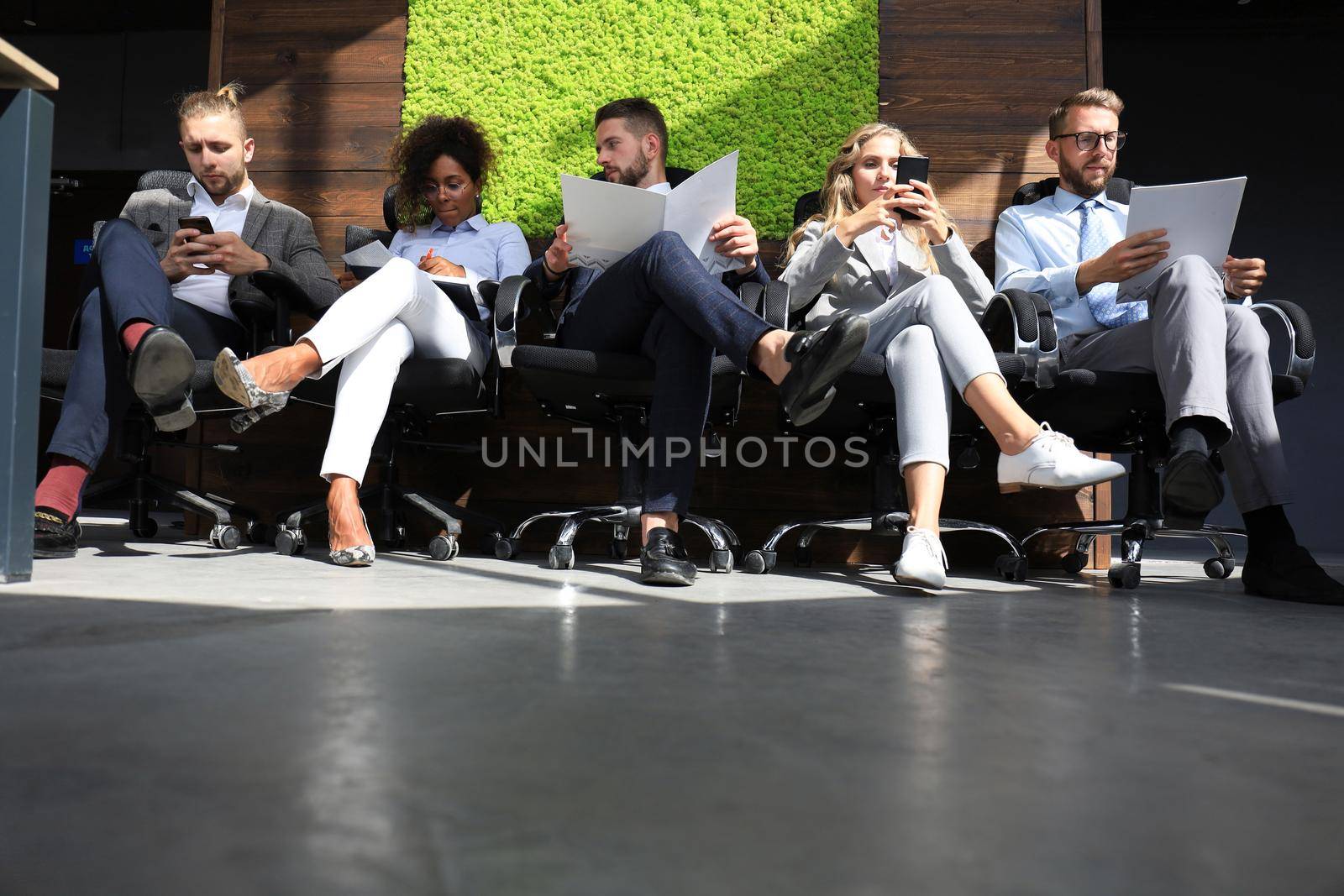Modern business people waiting for job interview.