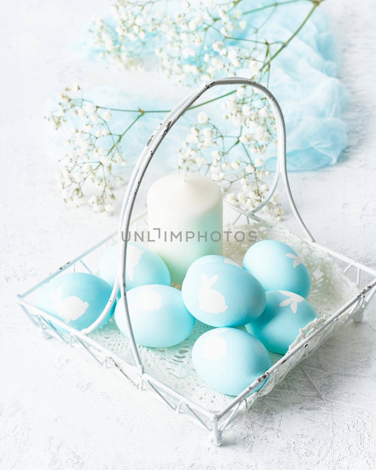Easter. Holiday. Light white background, gentle pastel colors. Flowers in background, vertical by NataBene
